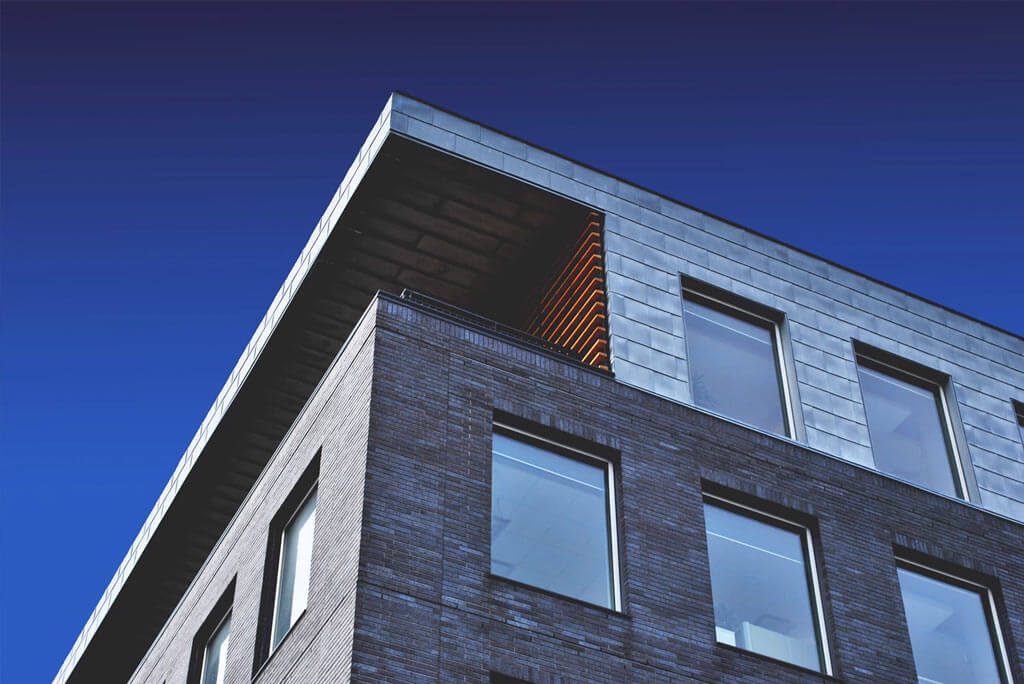 Corner of the top two floors of a Large Concrete Building